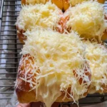 Cheese Ensaymada: Irresistibly Buttery Filipino Delight 8 CHEESE ENSAYMADA(Filipino Sweet Bread)