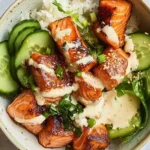 Delicious Salmon Bites Bowl with Cucumber Salad Delight 7 Salmon Bites Bowl with Cucumber Salad